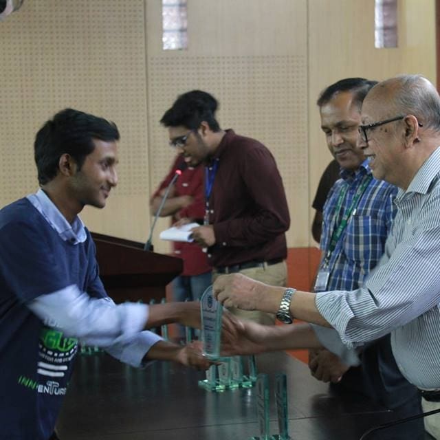 Receiving a crest at AUST Innoventure 2017