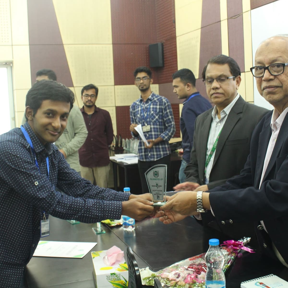 Receiving a crest at AUST Technomania 2018